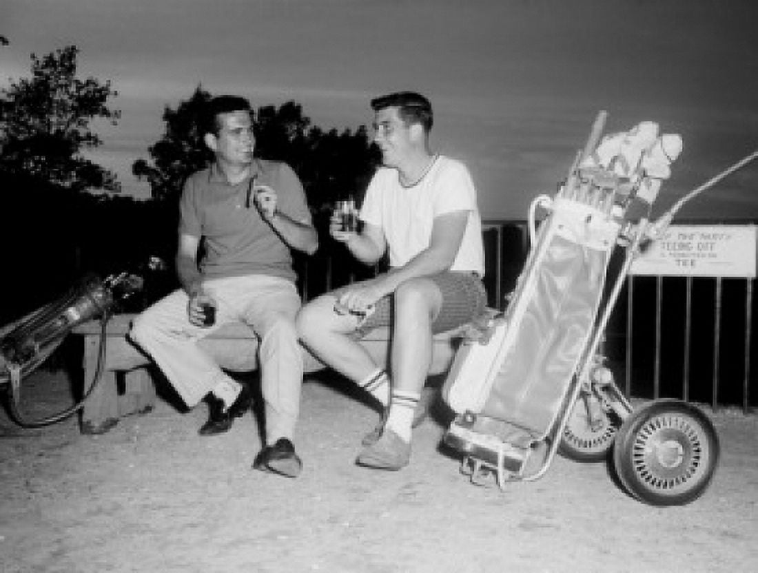 Pair of friends having resting after golf session Canvas Art - (24 x 36)