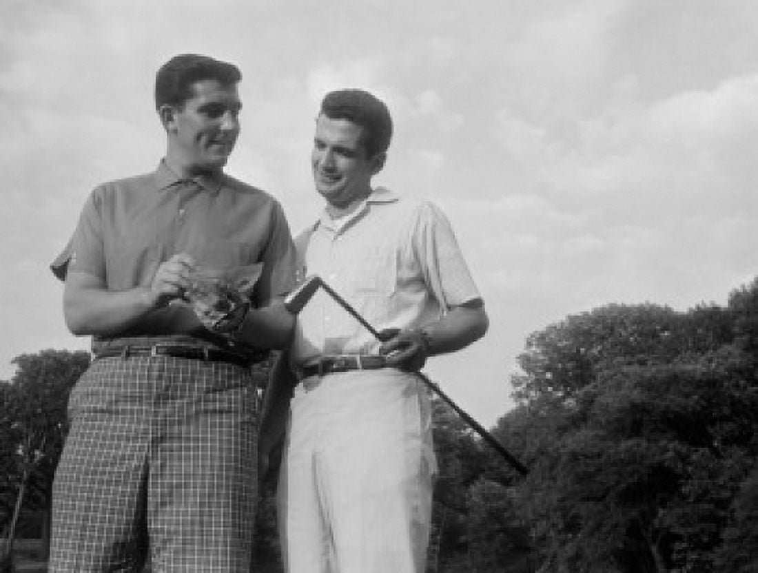 Pair of male golfers checking score Canvas Art - (18 x 24)