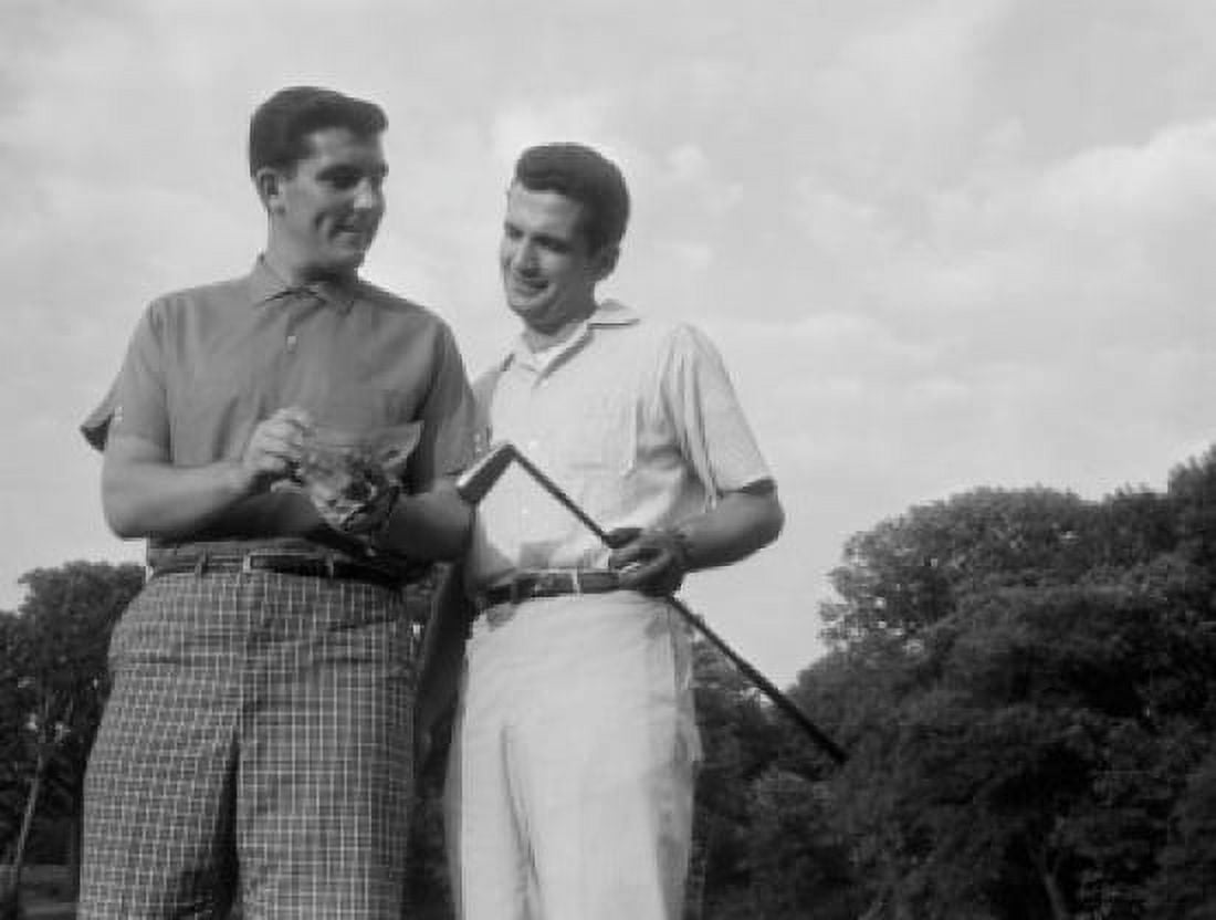 Pair of male golfers checking score Canvas Art - (24 x 36)