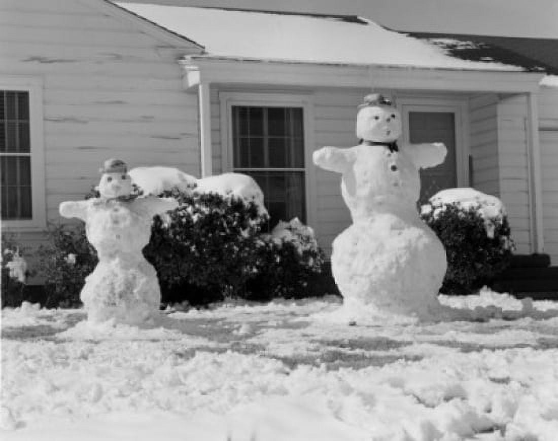Pair of snowmen in front of home in winter Canvas Art -  (18 x 24)