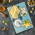 thumbnail image 1 of Pale Blue Cutting Board, Soft Pastel Tone Sky and Clouds Fantasy High Freedom Heaven Sunny Illustration, Decorative Tempered Glass Cutting and Serving Board, in 3 Sizes, by Ambesonne, 1 of 2