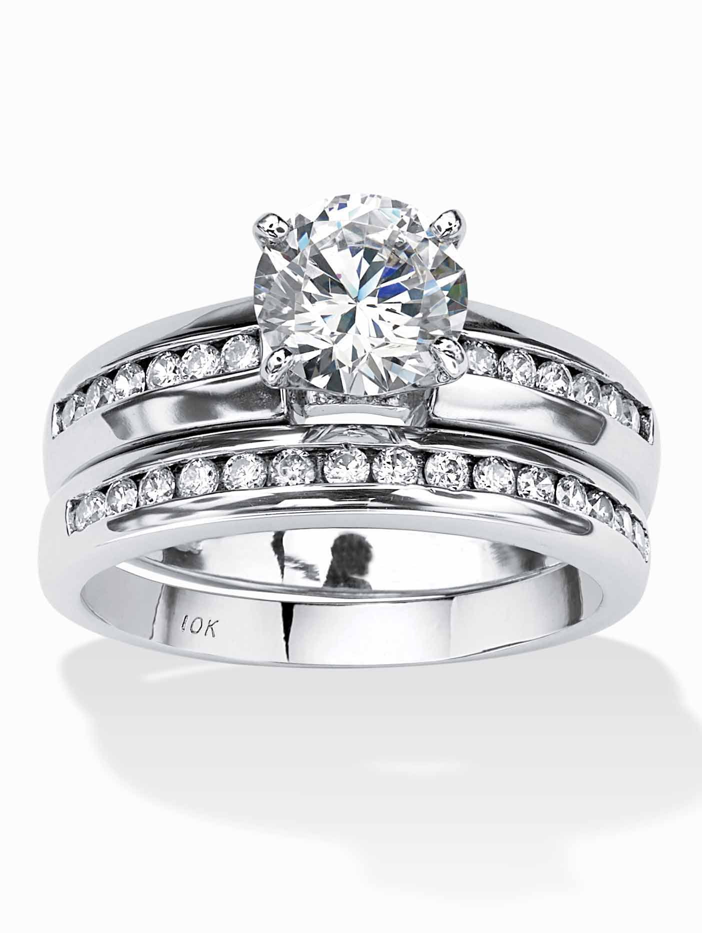 10K white gold channel offers set half eternity ring set with 8 round faceted cz’s, vintage ring