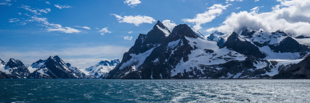 Panorama of mountains at entrance to fjord Antarctica Canvas Art - Nick Dale Design Pics (26 x 8)