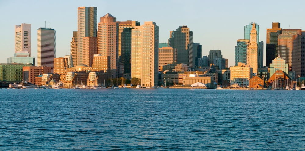 Panoramic of Boston Harbor and the Boston skyline at sunrise as seen from South Boston Massachusetts New England Canvas Art - Panoramic Images (36 x 12)