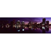 Panoramic Images Buildings lit up at night in a city Lake Eola Orlando Orange County Florida USA 2010 Poster Print by Panoramic Images