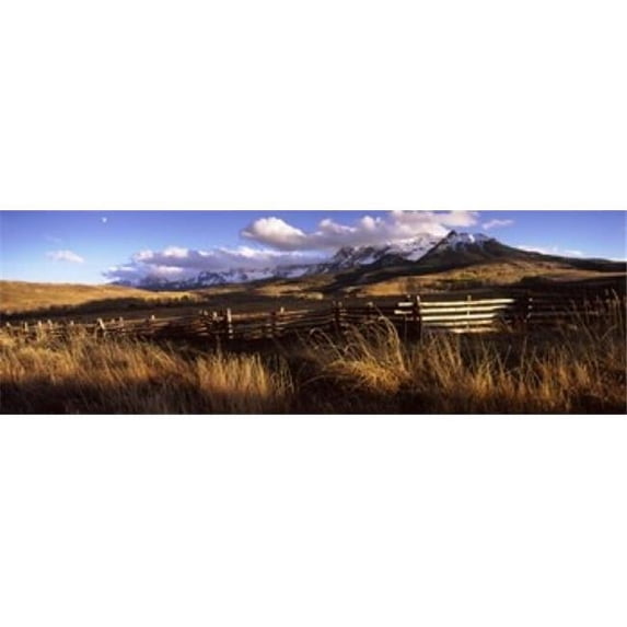 Panoramic Images PPI118776L Fence with mountains in the background Colorado USA Poster Print by Panoramic Images - 36 x 12