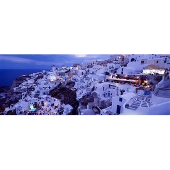 Panoramic Images  High angle view of buildings in a city Santorini Cyclades Islands Greece Poster Print by Panoramic Images - 36 x 12