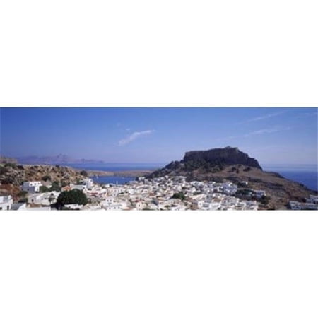 Panoramic Images Houses on an island Lindos Rhode Island Dodecanese Greece Poster Print by Panoramic Images - 36 x 12