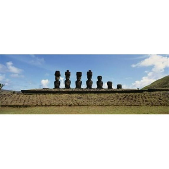 Panoramic Images PPI81485L Low angle view of Moai statues in a row Tahai Archaeological Site Rano Raraku Easter Island Chile Poster Print by Panoramic Images - 36 x 12