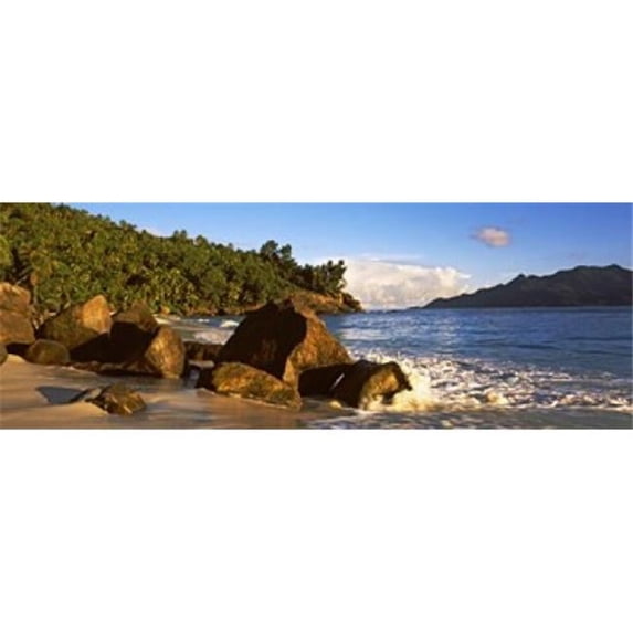 Panoramic Images PPI141947L Waves splashing onto rocks on North Island with Silhouette Island in the background Seychelles Poster Print by Panoramic Images - 36 x 12