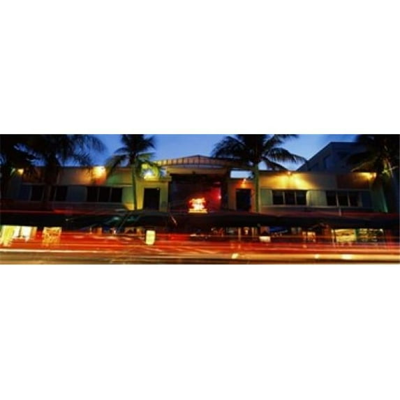Panoramic Images PPI143886L Traffic in front of a building at dusk Art Deco District South Beach Miami Beach Miami-Dade County Florida USA Poster Print by Panoramic Images - 36 x 12