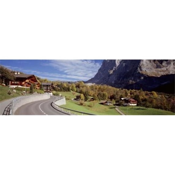 Panoramic Images PPI54560L Road passing through a landscape Grindelwald Interlaken Switzerland Poster Print by Panoramic Images - 36 x 12