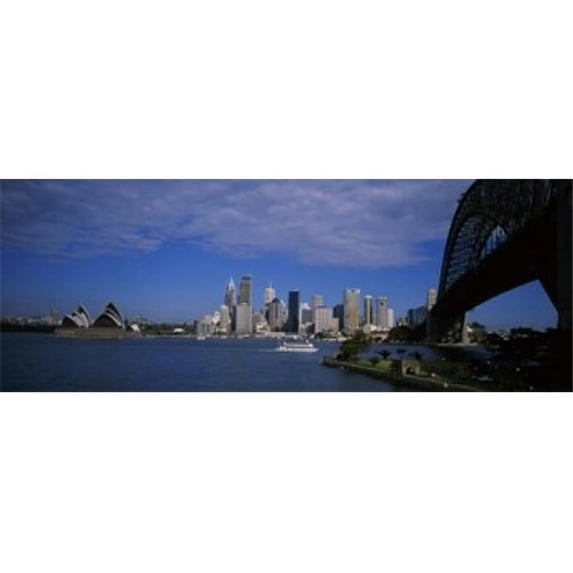 Panoramic Images PPI80075L Skyscrapers On The Waterfront Sydney Harbor Bridge Sydney New South Wales United Kingdom Australia Poster Print by Panoramic Images - 36 x 12