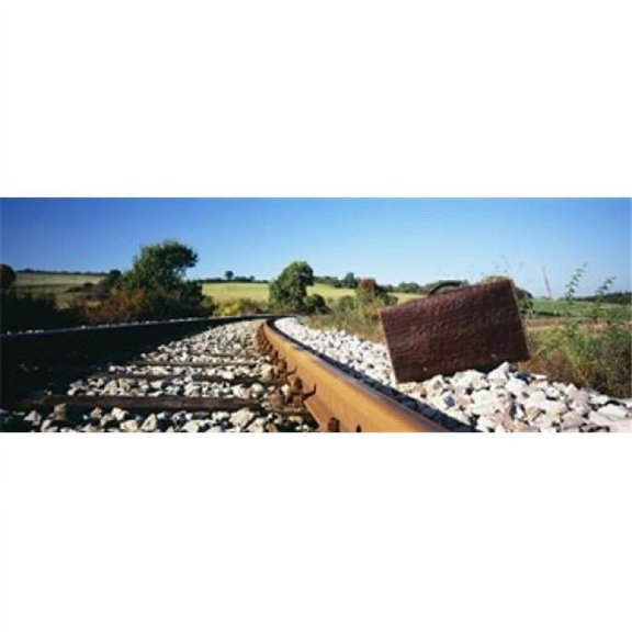 Panoramic Images PPI93719L Close-up of a suitcase on a railroad track Germany Poster Print by Panoramic Images - 36 x 12