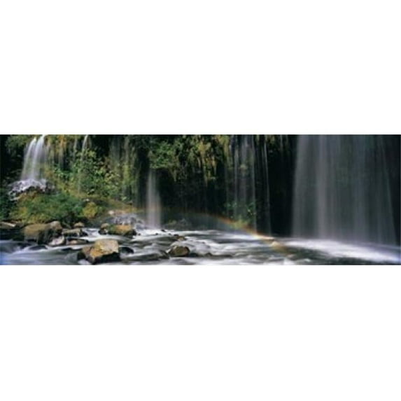 Panoramic Images Rainbow formed in front of a waterfall in a forest Dunsmuir Siskiyou County California USA Poster Print by Panoramic Images - 36 x 12