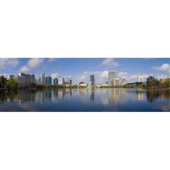 Panoramic Images Reflection of buildings in a lake Lake Eola Orlando Orange County Florida USA 2010 Poster Print by Panoramic Images - 36 x 12