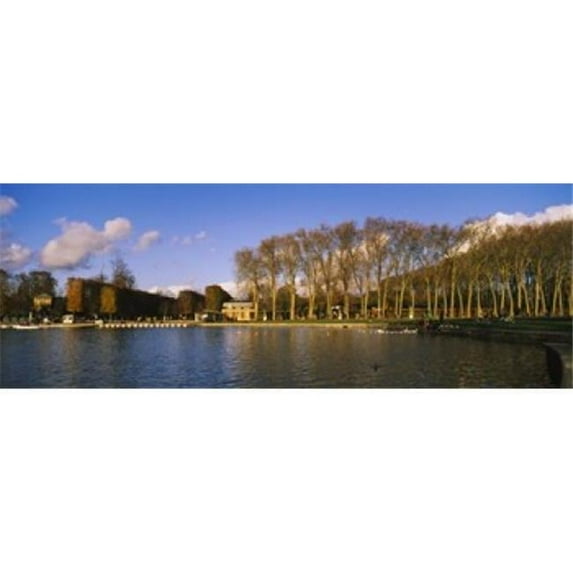 Panoramic Images PPI103516L Trees along a lake Chateau de Versailles Versailles Yvelines France Poster Print by Panoramic Images - 36 x 12