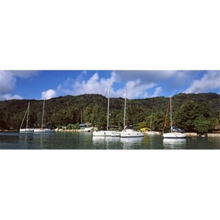 Panoramic Images Yachts anchored at the harbor on La Digue Island Seychelles Poster Print by Panoramic Images - 36 x 12