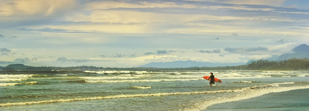 Panoramic Of Surfer On Long Beach Vancouver Island BC Canada Canvas Art - Will Datene Design Pics (36 x 12)
