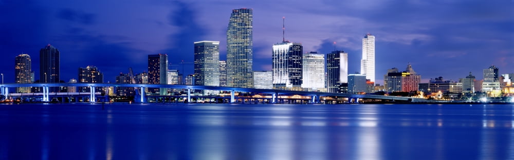 Panoramic View Of An Urban Skyline At Night Miami Florida USA Canvas Art - Panoramic Images (27 x 9)