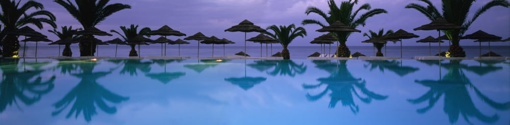 Panoramic View Of Infinity Pool Canvas Art - Marc Jackson Design Pics (33 x 8)