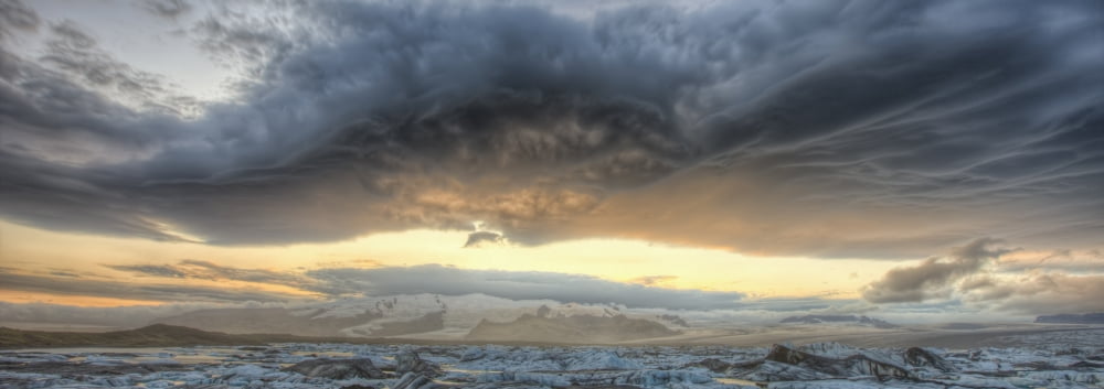 Panoramic View Of Lenticular Clouds Over The Ice Lagoon Of Jokulsarlon At Sunset Iceland Canvas Art - Robert Postma Design Pics (23 x 8)