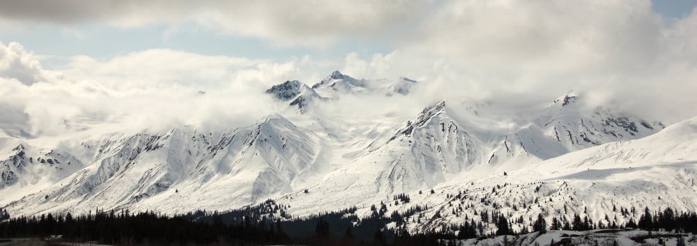 Panoramic View Of Snow-Covered St Elias Mountains And Clearing Storm Northern British Columbia Canvas Art - Robert Postma Design Pics (44 x 15)
