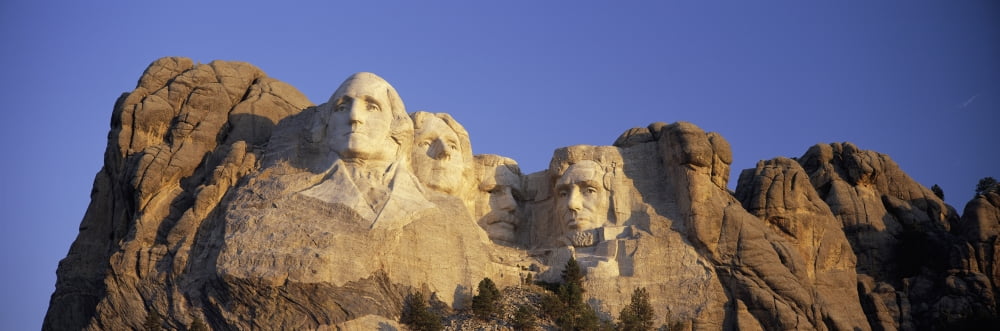 Panoramic sunrise view on Presidents George Washington Thomas Jefferson Teddy Roosevelt and Abraham Lincoln at Mount Rushmore National Memorial South Dakota Canvas Art - Panoramic Images (36 x 12)