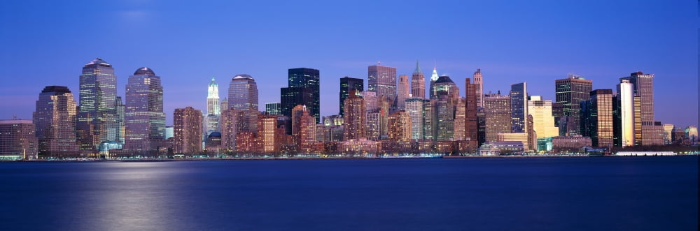 Panoramic sunset view of Empire State Building and Lower Manhattan skyline NY where World Trade Towers were located Canvas Art - Panoramic Images (27 x 9)