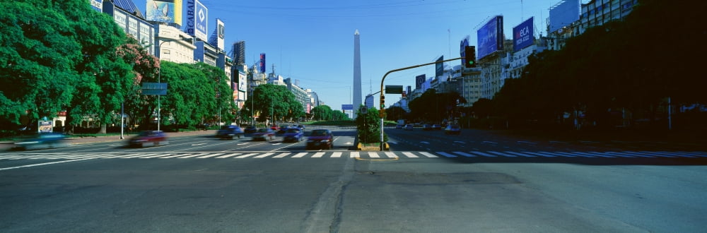 Panoramic view of Avenida 9 de Julio widest avenue in the world and El Obelisco The Obelisk Buenos Aires Argentina Canvas Art - Panoramic Images (36 x 12)