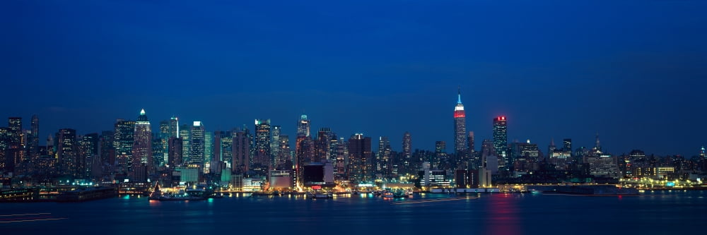 Panoramic view of Empire State Building and Manhattan NY skyline with Hudson River and harbor shot from Weehawken NJ Canvas Art - Panoramic Images (27 x 9)