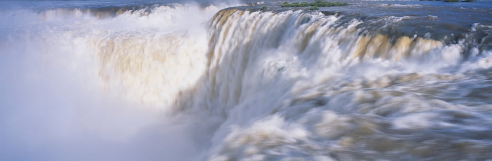 Panoramic view of Iguazu Waterfalls in Parque Nacional Iguazu Garganto del Diablo Salto Union border of Brazil and Argentina Canvas Art - Panoramic Images (27 x 9)