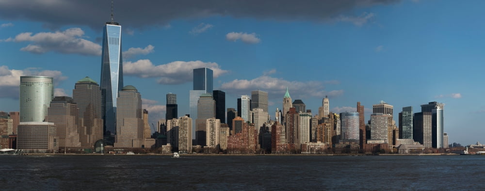 Panoramic view of New York City Skyline on water featuring One World Trade Center (1WTC) Freedom Tower New York City New York USA City New York USA Canvas Art - Panoramic Images (27 x 9)