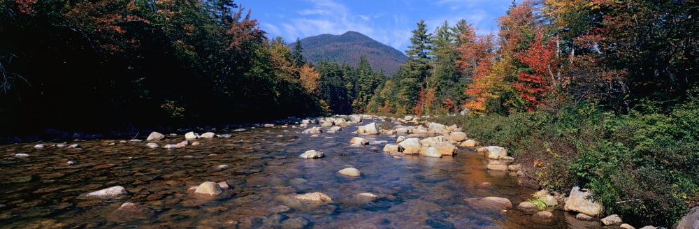 Panoramic view of an autumn waterway along the Kancamagus Highway in the White Mountain National Forest New Hampshire Canvas Art - Panoramic Images (27 x 9)