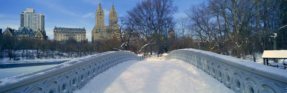 Panoramic view of bridge over frozen pond in Central Park Manhattan NY on upper west side near Central Park West Canvas Art - Panoramic Images (36 x 12)