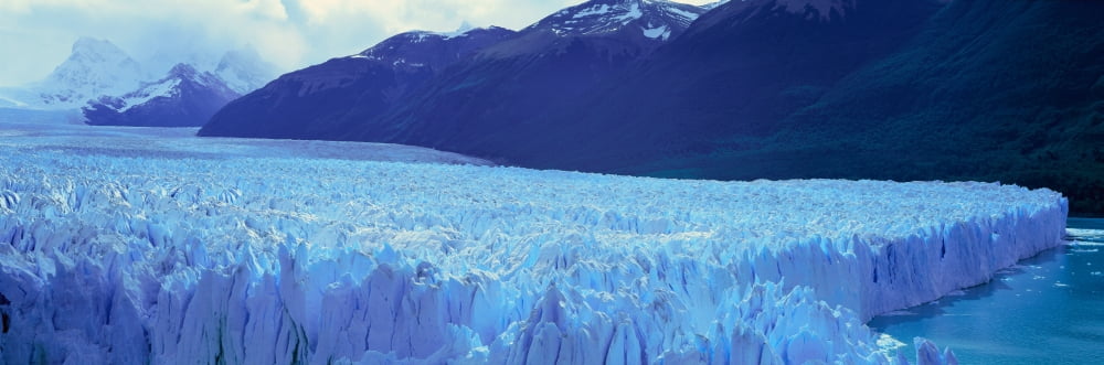 Panoramic view of icy formations of Perito Moreno Glacier at Canal de Tempanos in Parque Nacional Las Glaciares near El Calafate Patagonia Argentina Canvas Art - Panoramic Images (36 x 12)