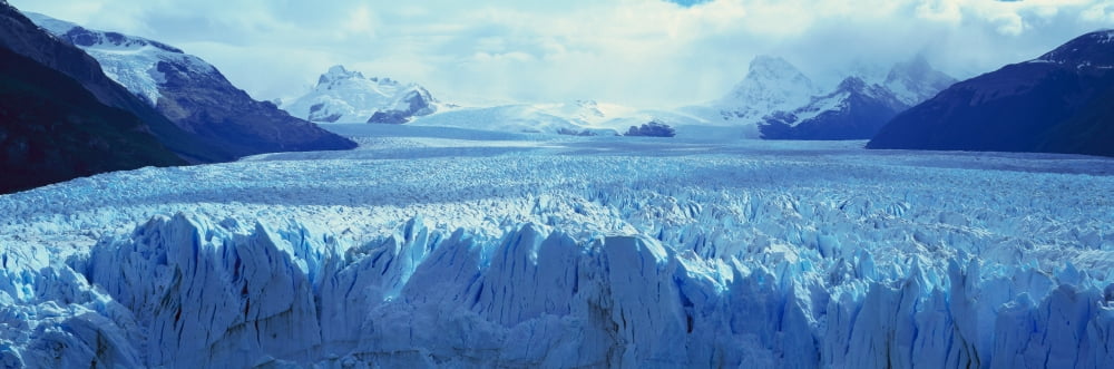 Panoramic view of icy formations of Perito Moreno Glacier at Canal de Tempanos in Parque Nacional Las Glaciares near El Calafate Patagonia Argentina Canvas Art - Panoramic Images (36 x 12)