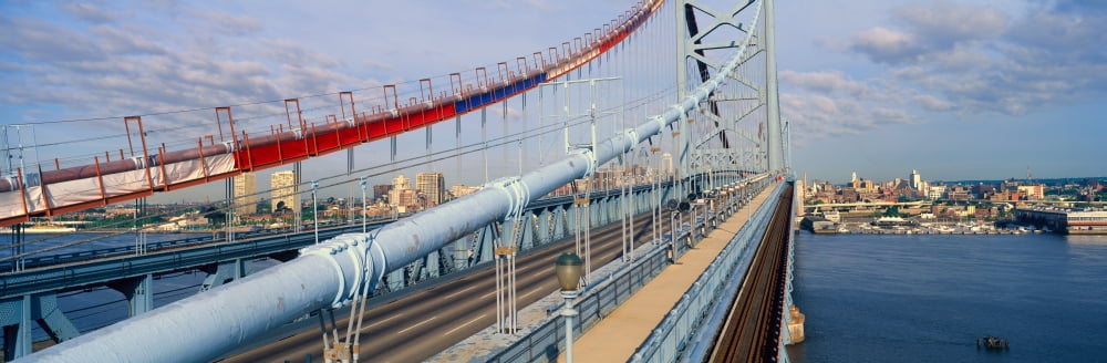 Panoramic view of Ben Franklin Bridge over Delaware River to Philadelphia PA as seen from Camden NJ Canvas Art - Panoramic Images (36 x 12)
