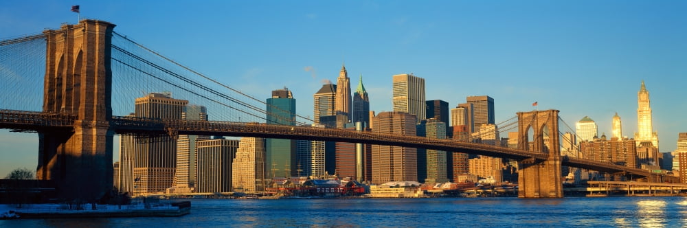 Panoramic view of Brooklyn Bridge and East River at sunrise with New York City NY skyline post 911 view Canvas Art - Panoramic Images (27 x 9)