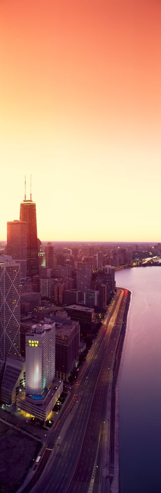 Panoramic view of Chicago skyline and John Hancock building at sunset Chicago IL Canvas Art - Panoramic Images (27 x 9)