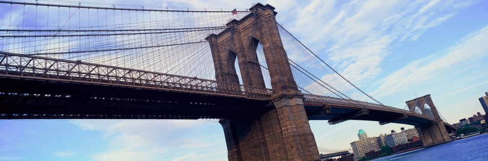 Panoramic view of East River and Brooklyn Bridge to lower Manhattan New York City NY Canvas Art - Panoramic Images (27 x 9)