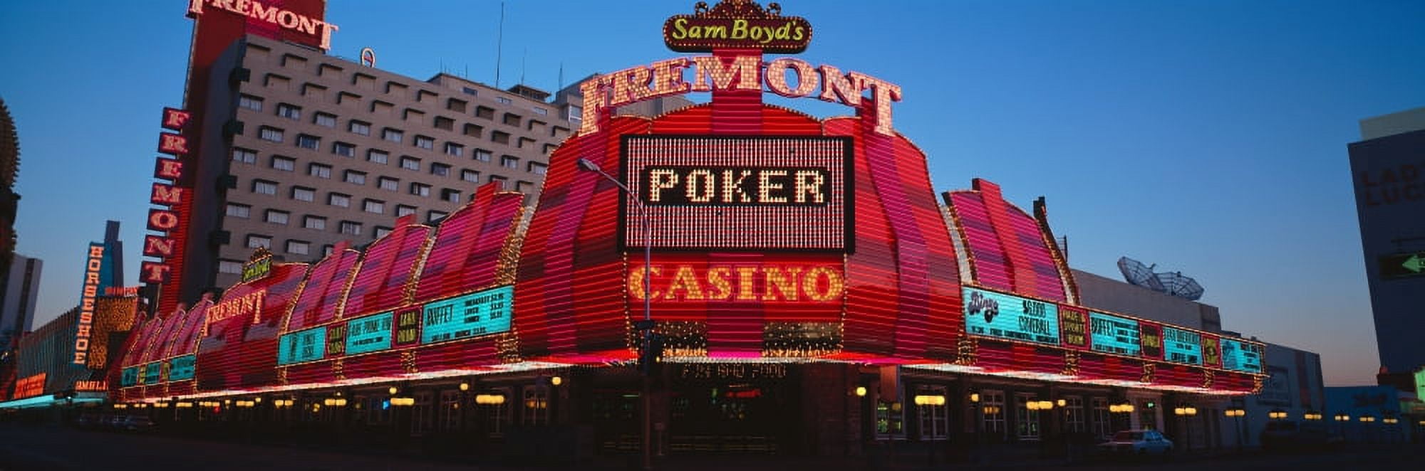 Panoramic view of Fremont Casino and Neon sign at dusk in Las Vegas NV Canvas Art - Panoramic Images (27 x 9)