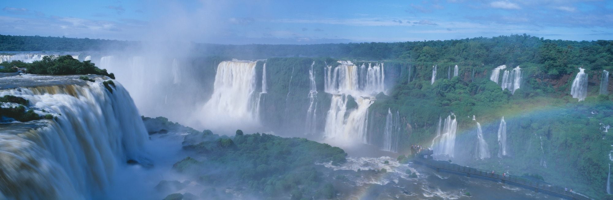 Panoramic view of Iguazu Waterfalls in Parque Nacional Iguazu Salto Floriano Brazil Canvas Art - Panoramic Images (27 x 9)