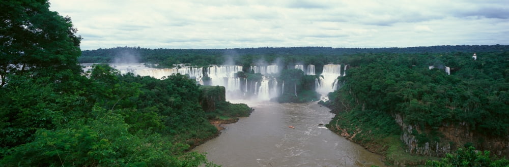 Panoramic view of Iguazu Waterfalls in Parque Nacional Iguazu border of Brazil and Argentina Canvas Art - Panoramic Images (36 x 12)