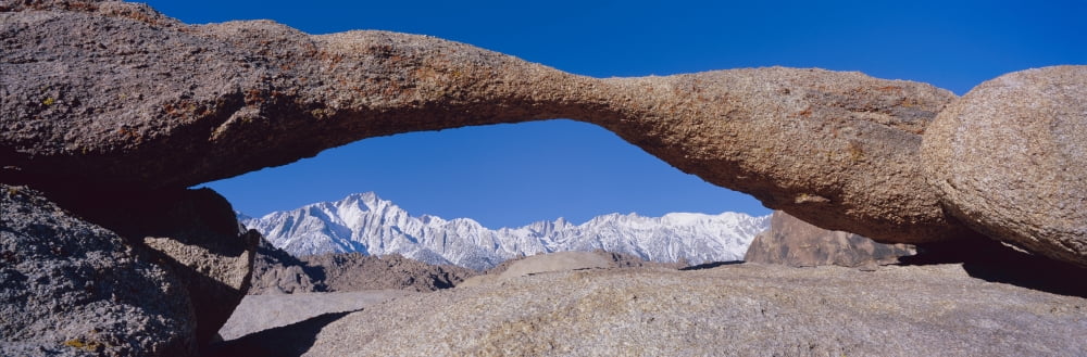 Panoramic view of Mount Whitney framed through Alabama Hills Arch in Alabama Hills near Lone Pine California Canvas Art - Panoramic Images (36 x 12)