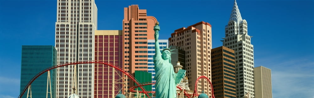 Panoramic view of New York New York Hotel with Statue of Liberty at sunrise Las Vegas NV Canvas Art - Panoramic Images (36 x 12)