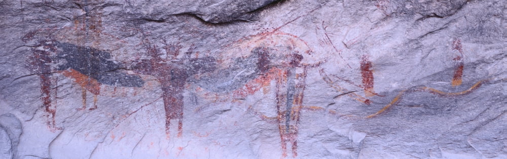 Panoramic view of Petroglyphs of stick figures from Atlati Rock NV Canvas Art - Panoramic Images (36 x 12)