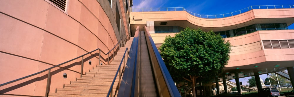 Panoramic view of escalator and stairs lead upwards in downtown Los Angeles California Canvas Art - Panoramic Images (36 x 12)