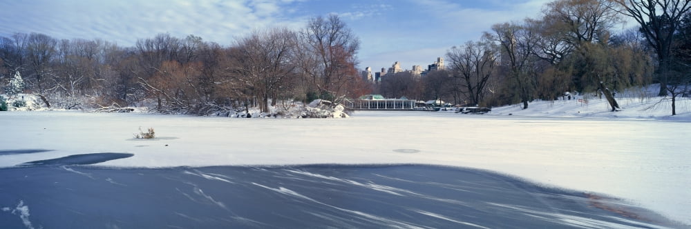 Panoramic view of frozen pond in Central Park Manhattan New York City NY after winter snowstorm Canvas Art - Panoramic Images (27 x 9)