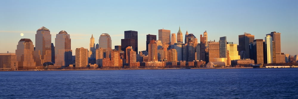 Panoramic view of full moon rising over lower Manhattan skyline NY where World Trade Towers were located Canvas Art - Panoramic Images (27 x 9)